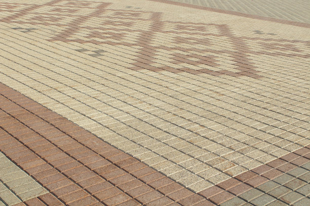 美丽的图案铺路石。特写镜头。视角。背景。纹理。图片下载