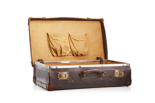 老式的老式棕色皮革手提箱上的白色图片下载