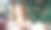 一个小女孩坐在咖啡馆里看着智能手机屏幕。图片下载