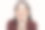 年轻美丽快乐的女人看着镜头在工作室与手在脸颊图片下载