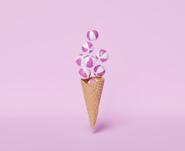 上面有沙滩球的饼干冰淇淋蛋筒图片下载