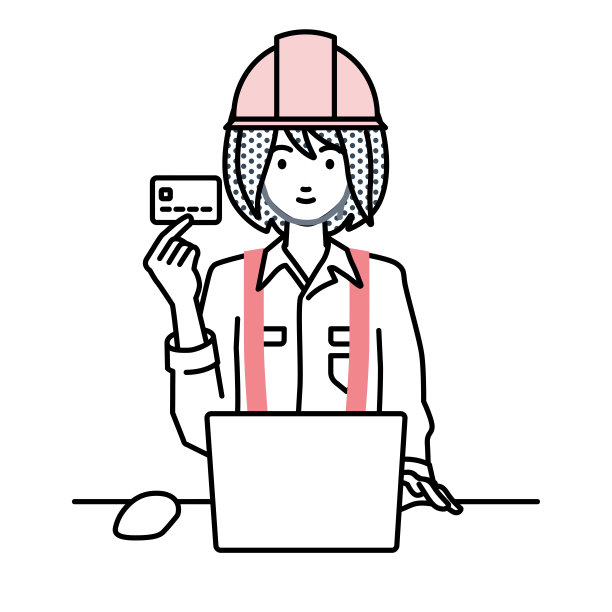 一位在建筑工地工作的妇女，在她的办公桌上使用笔记本电脑，手里拿着一张信用卡图片下载