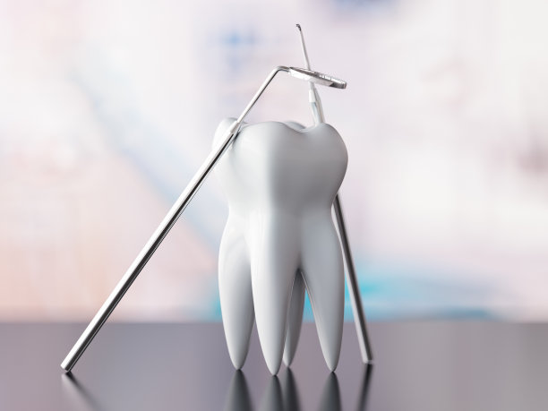 牙齿健康的概念与牙齿和牙医工具图片下载