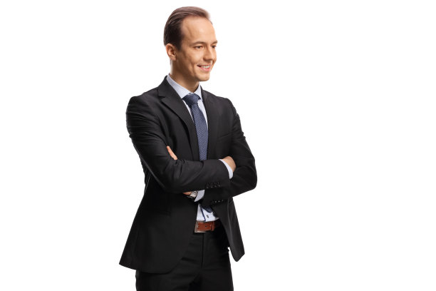 商人交叉双臂望向一边图片下载