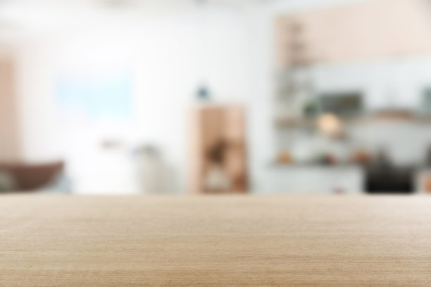 木制的桌子和模糊的房间背景。家具图片下载