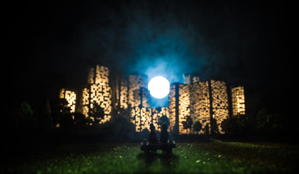 卡通风格的城市建筑。带有灯光的逼真的城市建筑微缩模型。背景。图片下载