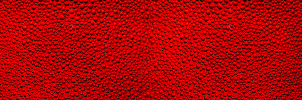 红色背景上的大水滴，红色背景上的水滴。图片下载