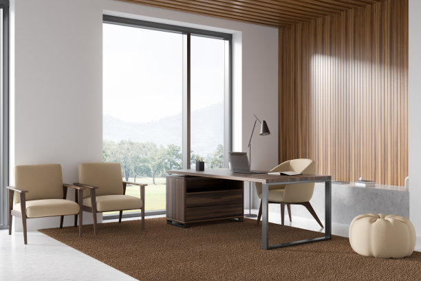 明亮的办公室内部与书桌和笔记本电脑的角景图片下载