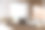 明亮的办公室内部与书桌和笔记本电脑的角景图片下载