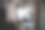 一名亚洲穆斯林中年男子在卧室的办公桌上舒服地用数码平板电脑工作图片下载