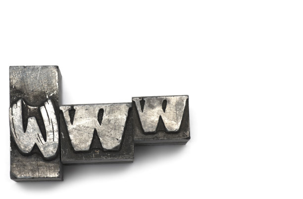 特写www打印机铅字白色背景图片下载