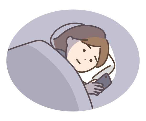 一个女人在睡觉前看手机图片下载