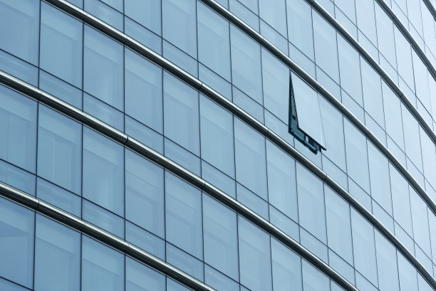 现代办公建筑立面。玻璃建筑特写图片下载