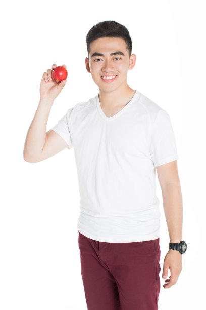 拿着新鲜水果的男孩图片下载