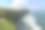 全景海景，海岸，悬崖。被淹没的场景鲜花和绿色覆盖的垂直悬崖在印度洋上。巴厘岛南部，Pura Luhur Uluwatu寺庙。印度尼西亚。图片下载