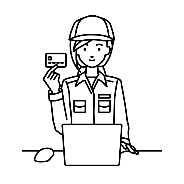 一位蓝领女工在她的办公桌前使用笔记本电脑，手里拿着一张信用卡图片下载