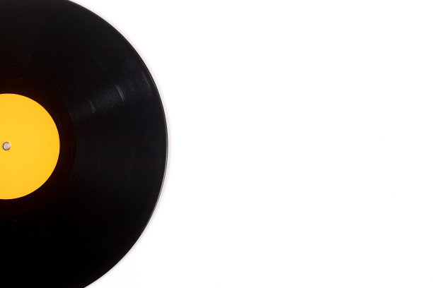 白底黑胶唱片。复古的风格。前视图。副本的空间。图片下载