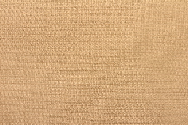 米色灯芯绒织物纹理。图片下载