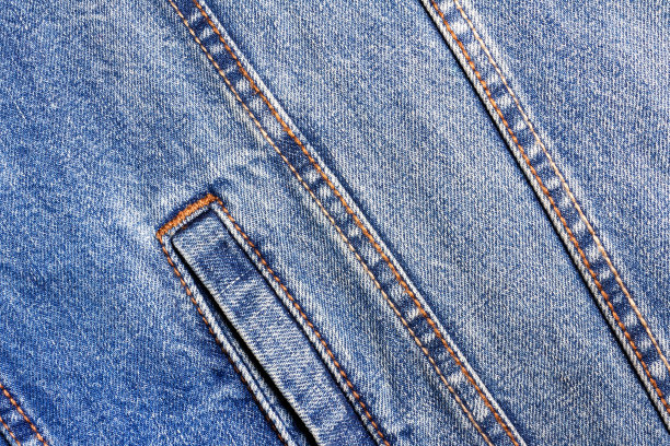 纹理背景照片的蓝色牛仔布。图片下载