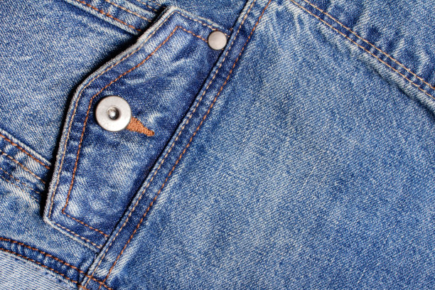 纹理背景照片的蓝色牛仔布。图片下载