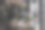 这是一张完整的黑色图片，上面是一排排带着亮绿色滤光片和蓝色玻璃目镜的防毒面具。机座侧面装有圆阀的燃料舱图片下载