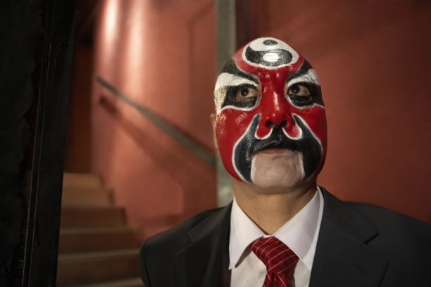 画脸谱的男商人图片下载