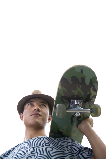 玩滑板的年轻男孩图片下载