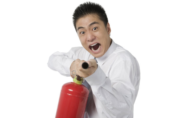 拿灭火器的商务人士图片下载