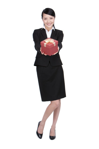 商务女士和礼物盒图片下载