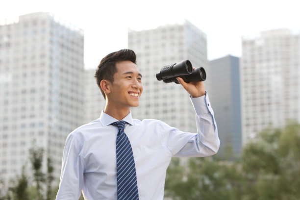 商务人士和望远镜图片下载