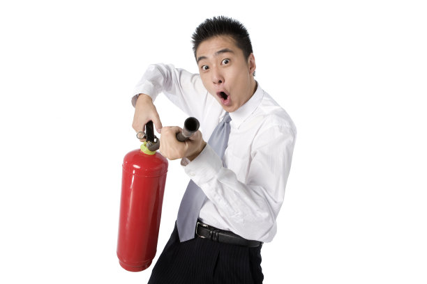 拿灭火器的商务人士图片下载