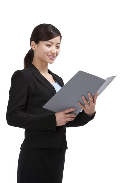 青年商务女士手捧文件夹图片下载