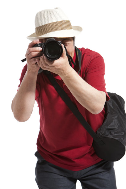 老年男子和相机图片下载