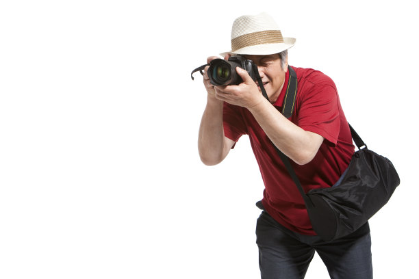 老年男子和相机图片下载