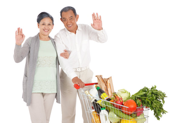 老年夫妇推着购物车图片下载