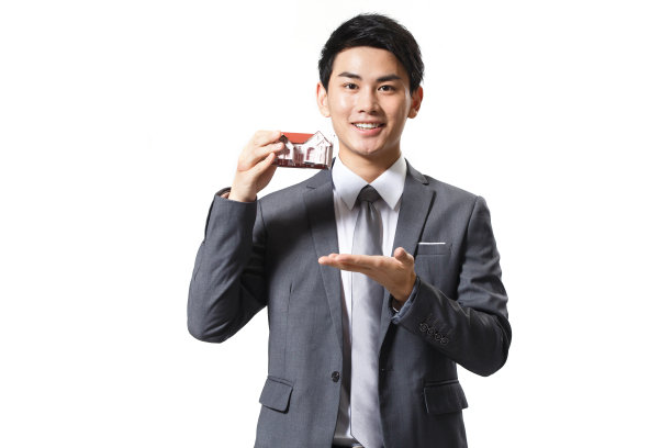 商务男人拿着房屋模型图片下载