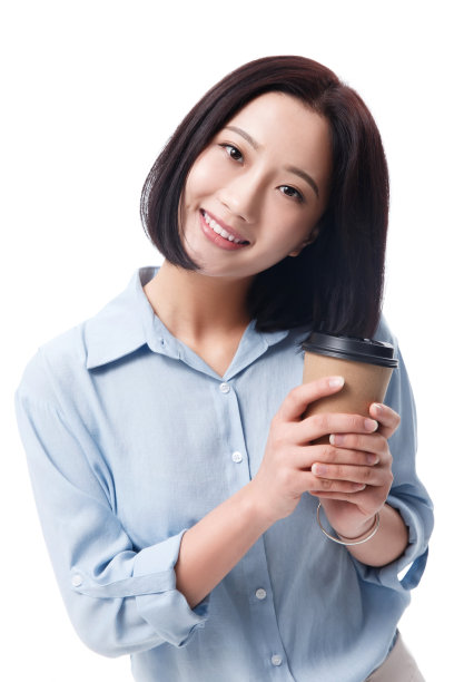 女白领手拿咖啡杯图片下载