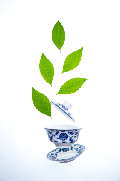 绿色的茶叶和茶杯图片下载