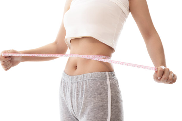 青年女人测量腰围图片下载