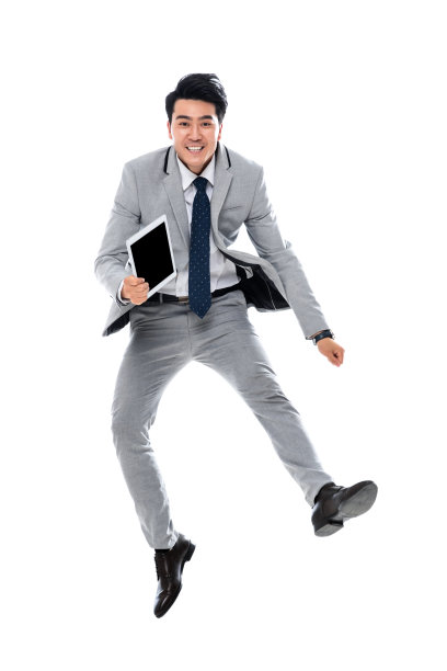 拿着平板电脑跳跃的商务男士图片下载