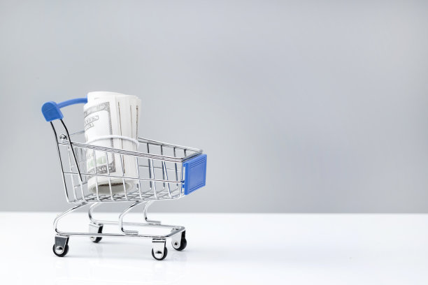 购物车和美国百元钞票卷图片下载