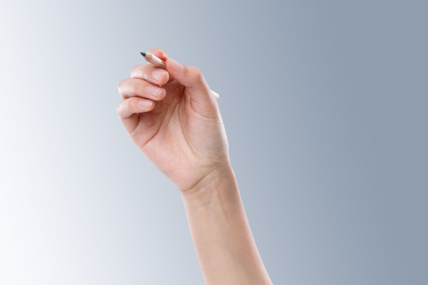 手拿铅笔图片下载