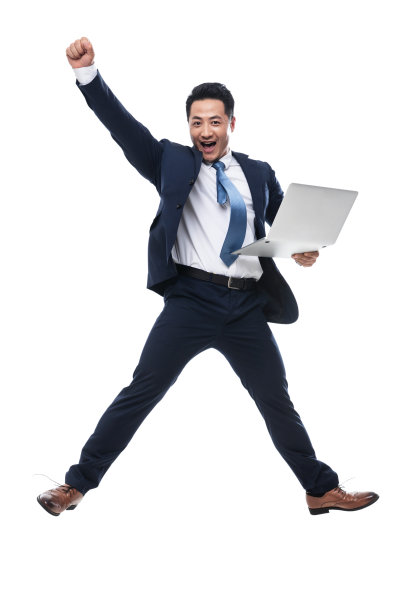 拿着笔记本电脑兴奋的商务男士图片下载