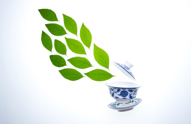 绿色的茶叶和茶杯图片下载