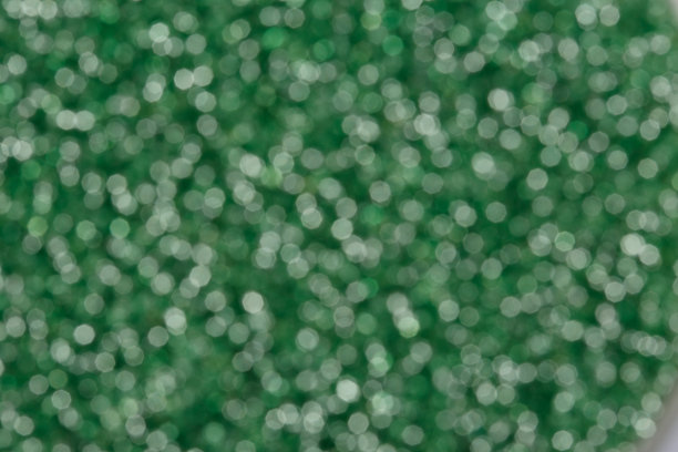 绿色深色散景背景。可用于设计项目。图片下载