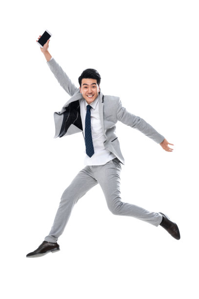 拿着手机跳跃的商务男士图片下载