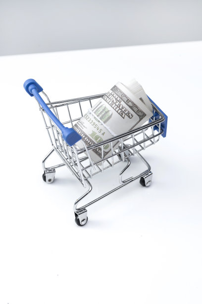 购物车和美国百元钞票卷图片下载