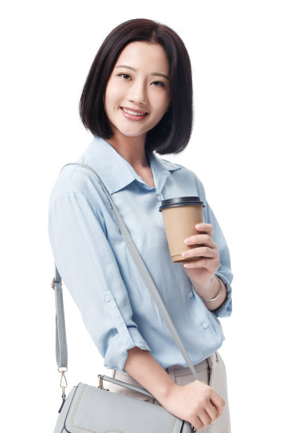 女白领手拿咖啡杯图片下载