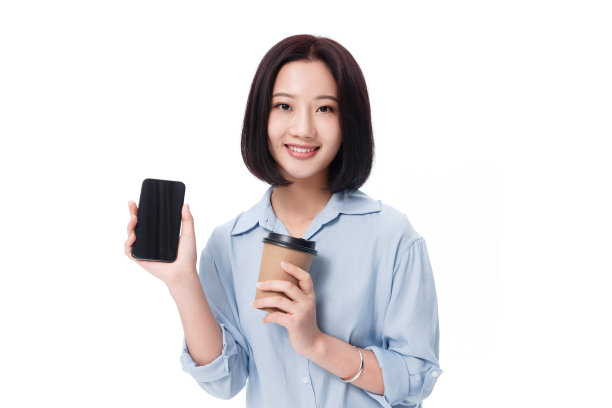 女白领手拿咖啡杯图片下载