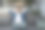 在家的男子坐在沙发上用笔记本电脑工作，双手放在脑后打瞌睡图片下载